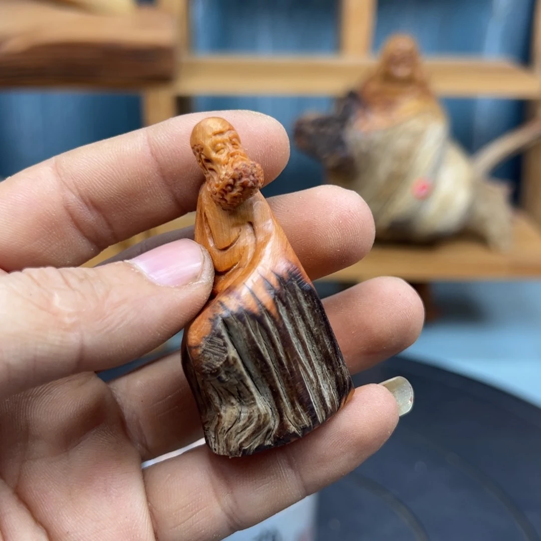 木一****）崖柏木摆件手把件