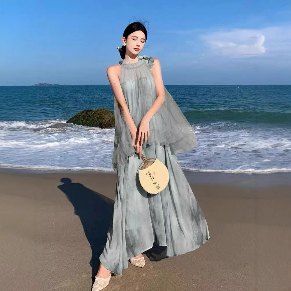 新中式飘逸气质仙女度假沙滩长裙网纱拼接印染假两件挂脖连衣裙夏