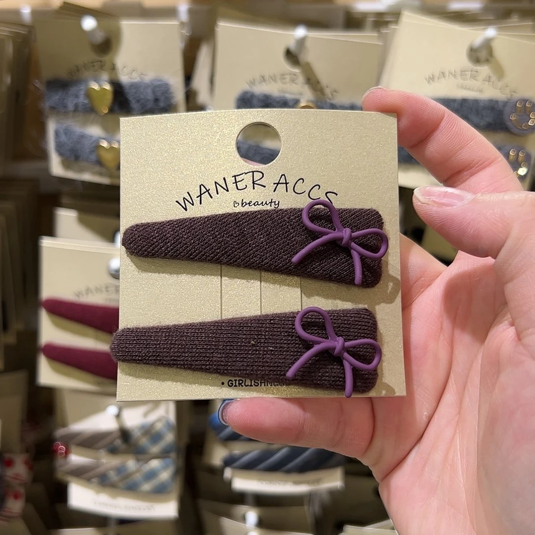 非金属布艺紫色蝴蝶结拜拜夹