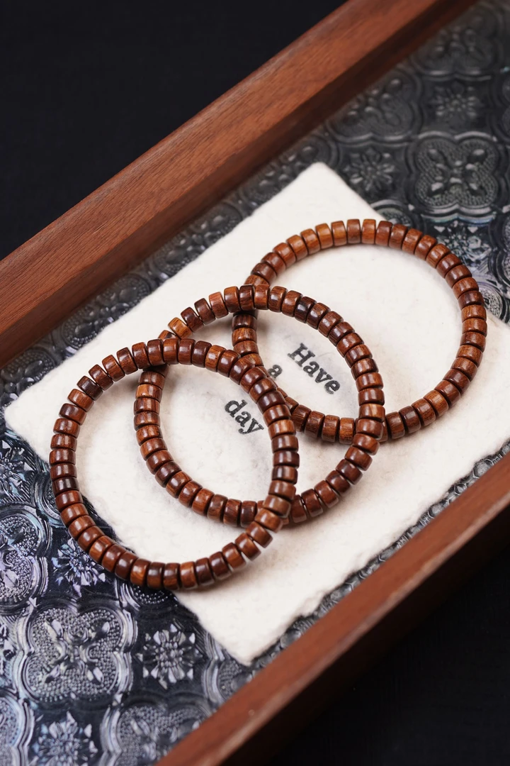 天然巴布亚贡木4*7mm药片单圈手串