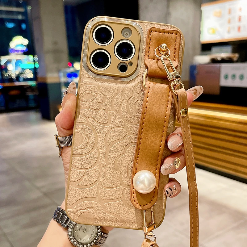 【适用苹果/华为/oppo/vivo/小米/荣耀】皮质山茶花腕带斜跨手机壳