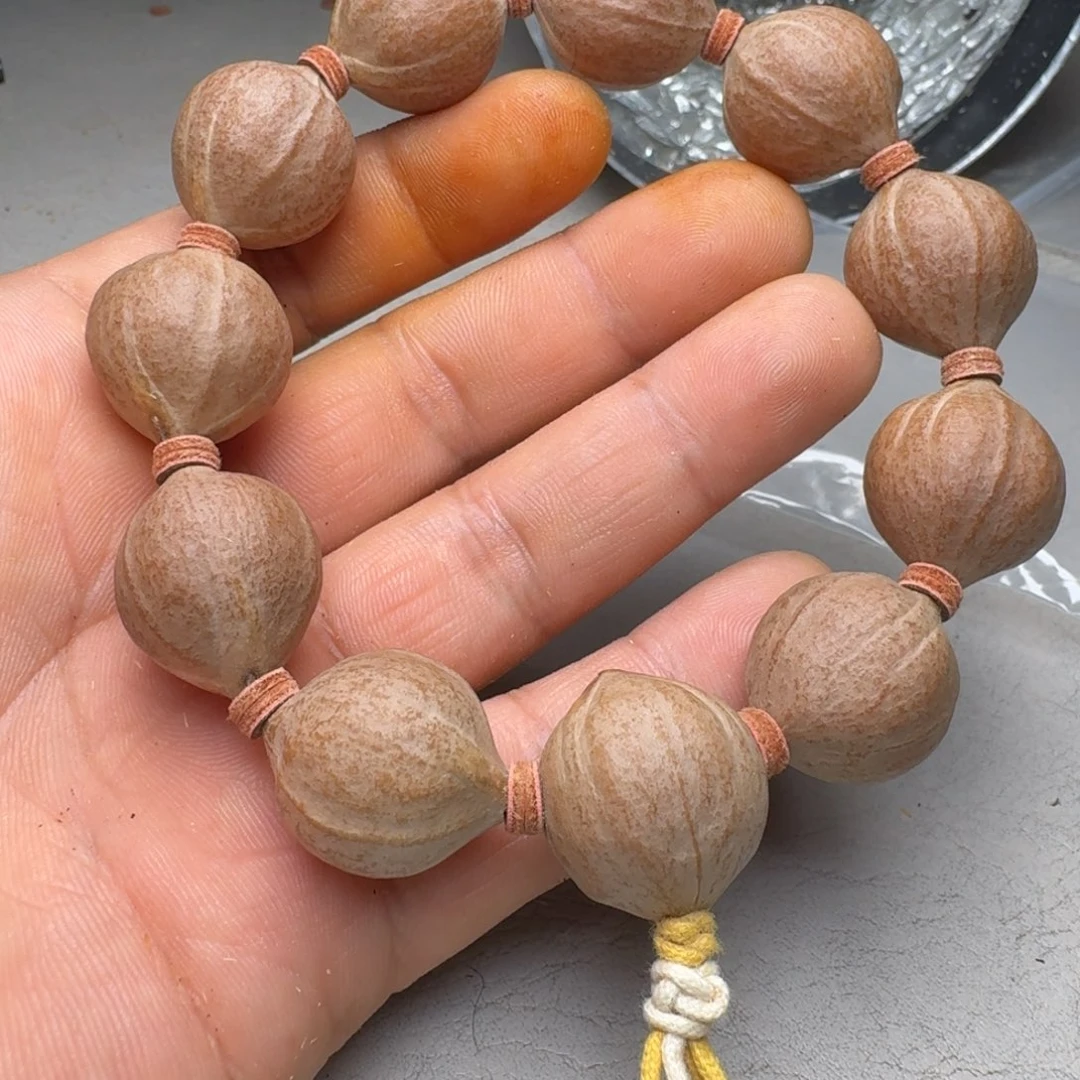 叁***耳橄榄核手串橄榄核