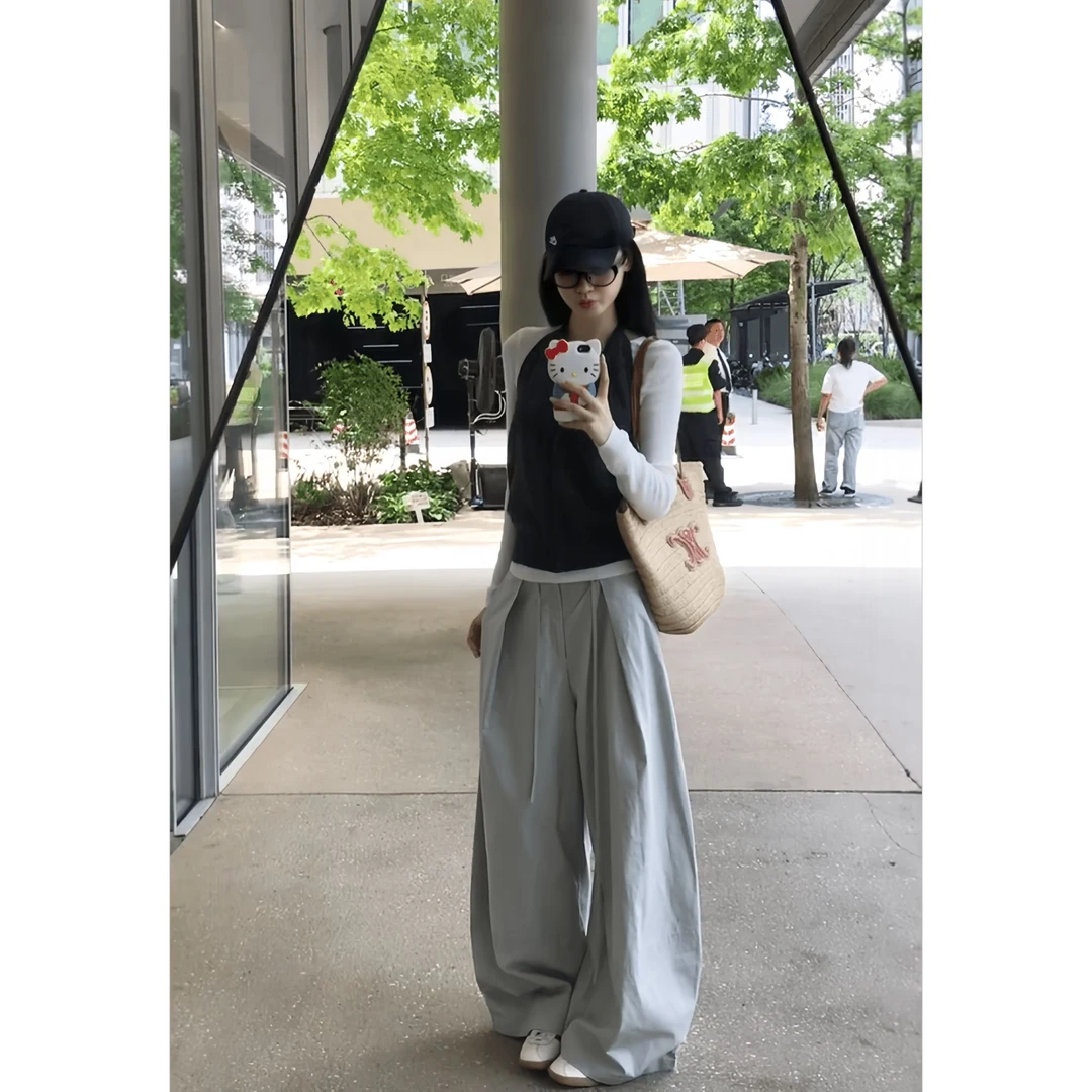 秋装女款爆款2025新款白色打底衫气质挂脖修身外穿马甲休闲裤套装
