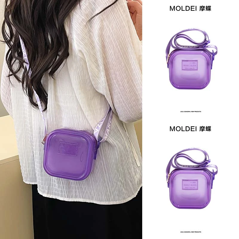 夏天迷你小包包女童2025新款紫色透明果冻包斜挎零钱钥匙包小方包