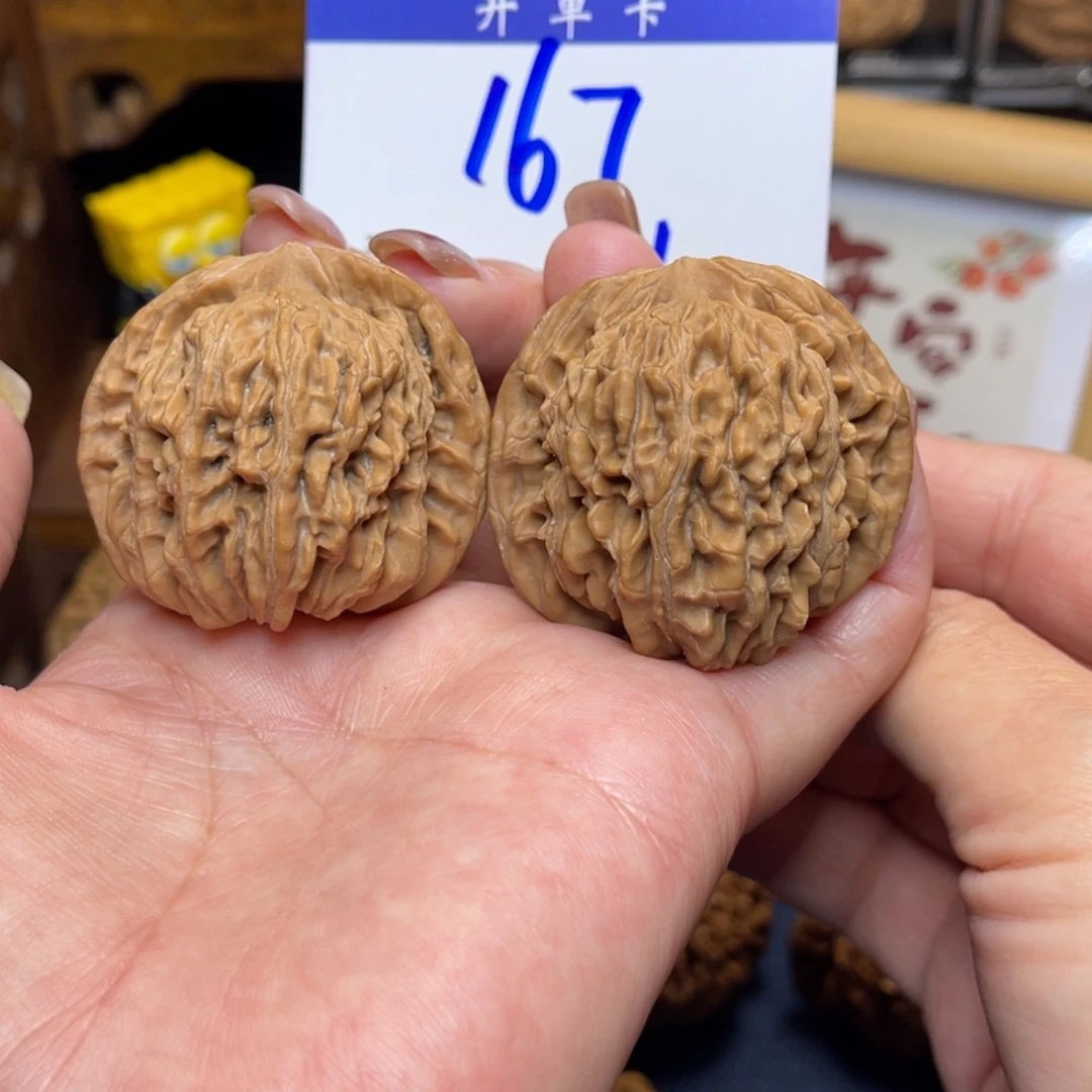 桃核把件平谷楼42李。