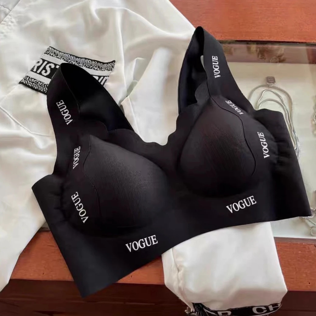 妮妮家199夏日时尚字母提拉侧收女士美背