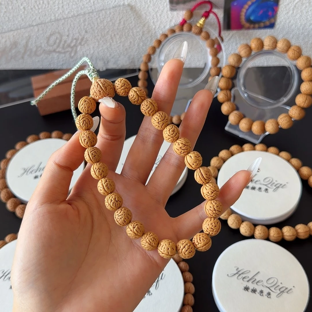 肉***饼野生小肠纹桃核吊坠