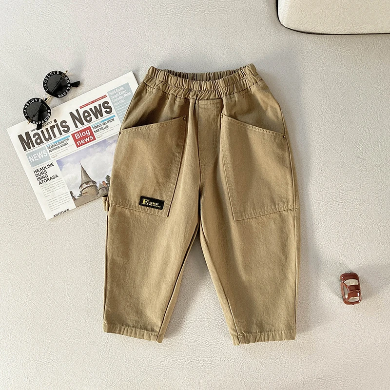 GUMI跨带贴黑标休闲裤