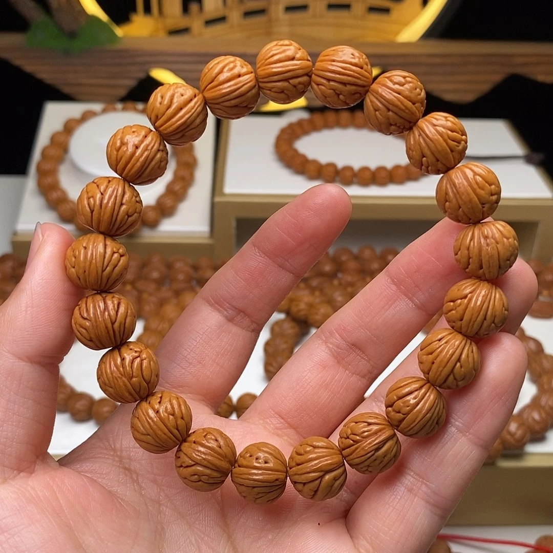 桃核手串12mm野生金麒麟桃核手串