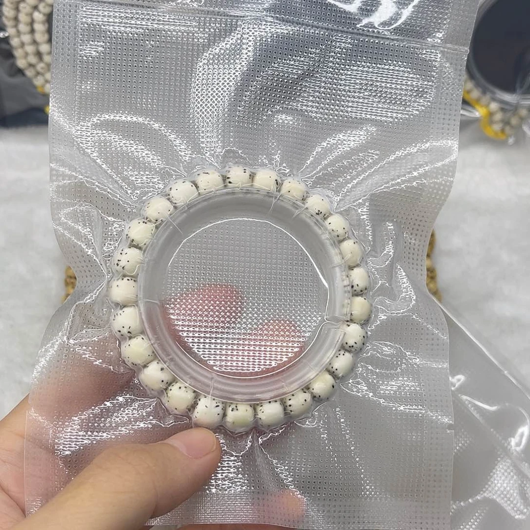银S9259*8原生态原白河豚单圈桶珠