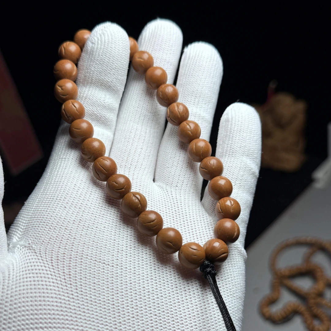 秦岭龙纹桃核光珠，文玩桃核手串，尺寸：9.9