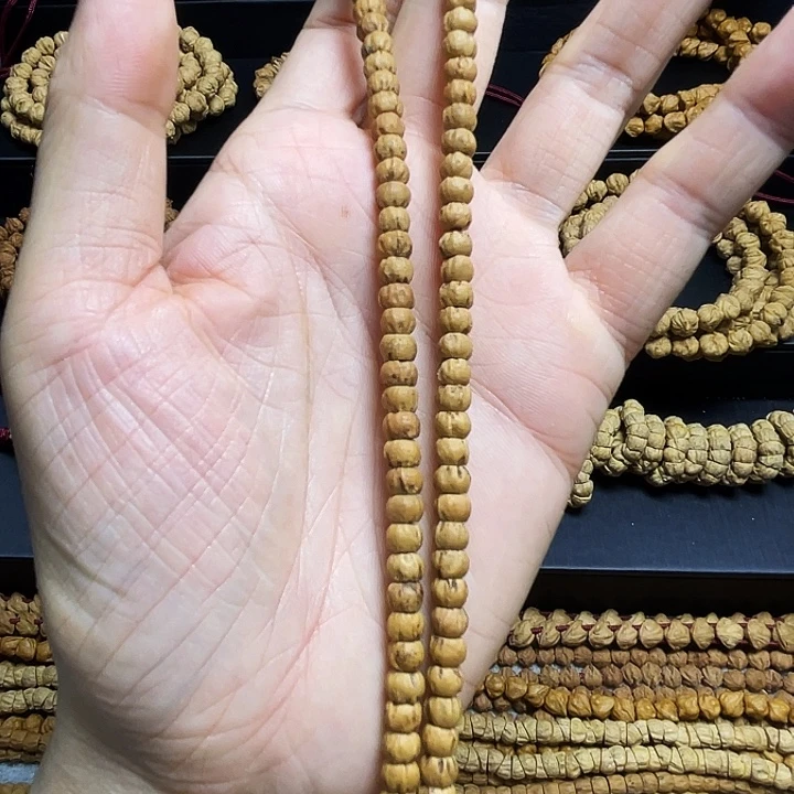 爱***团手串柏香籽/百香籽