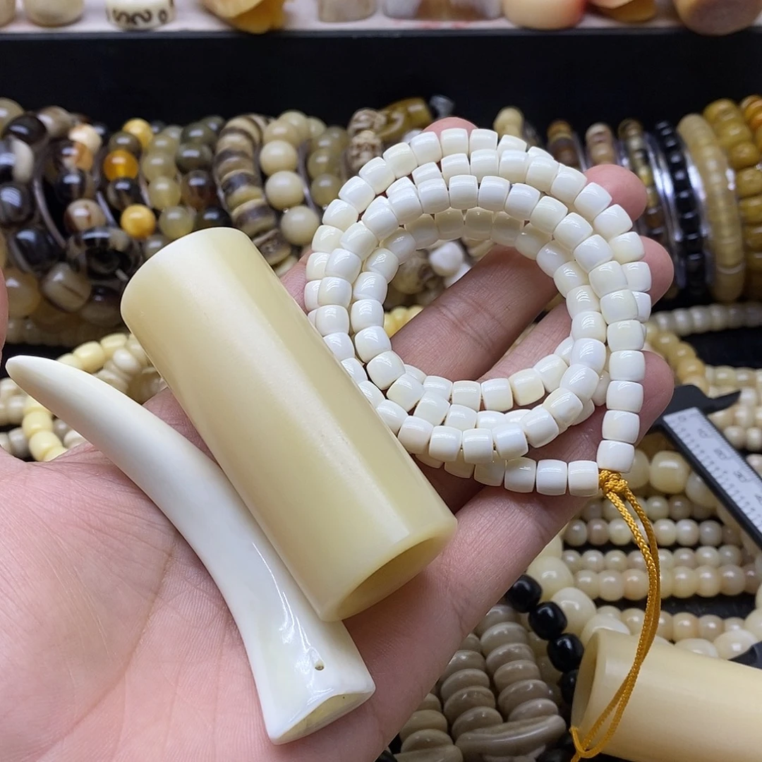 蠡***店牛骨手串/手链猪牙