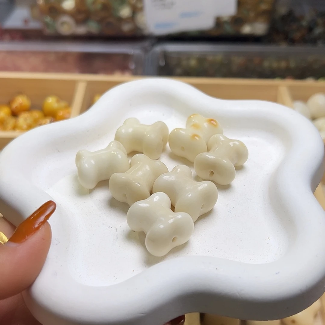 菩提根/象牙果吊坠嘭*嘭瑕疵骨头7颗表面孔道有裂