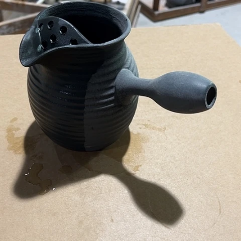 微瑕，明火。不能干烧，700毫升黑色