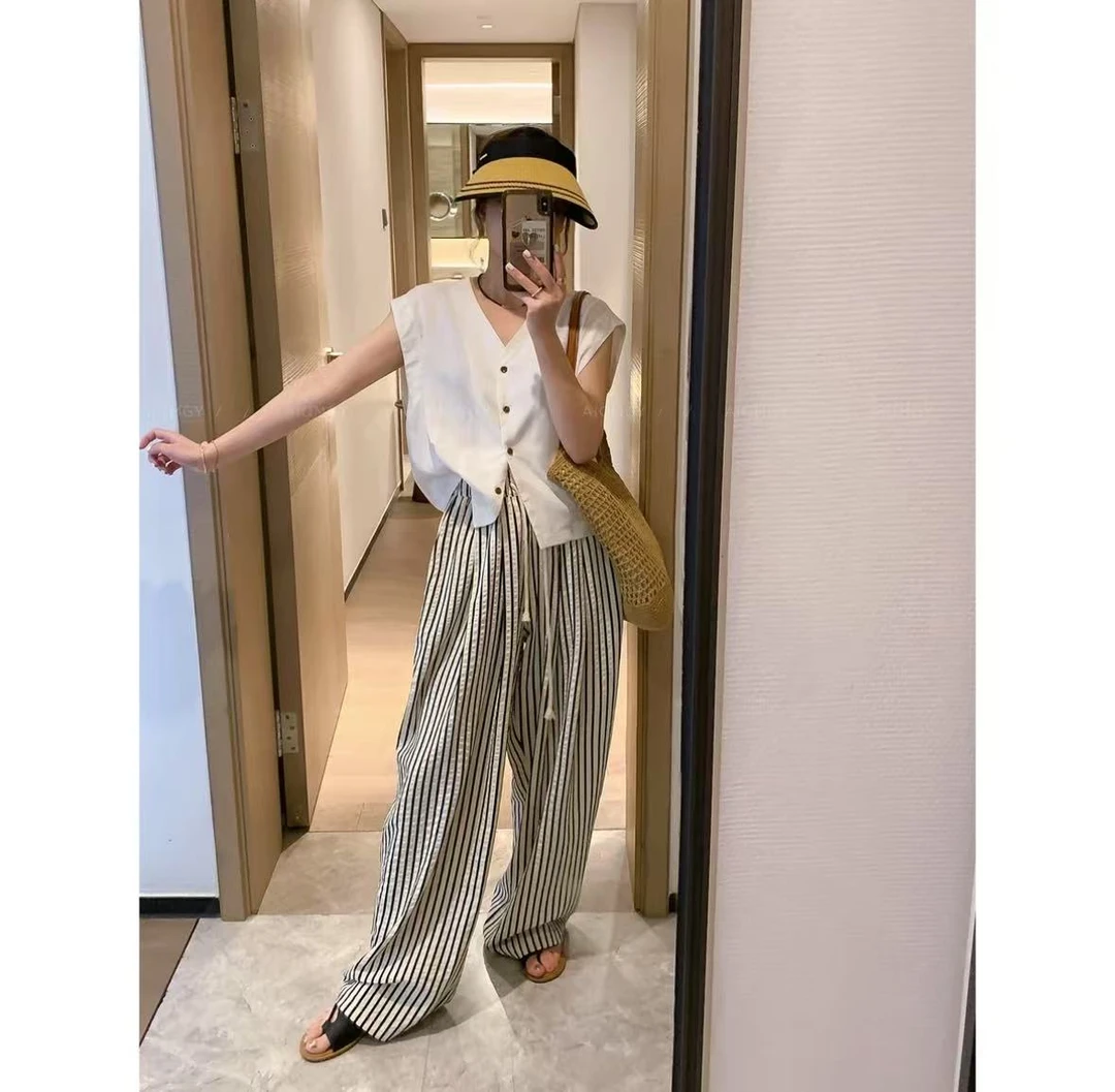 黄色无袖V领衬衫女2025夏季新款韩系时尚休闲百搭上衣