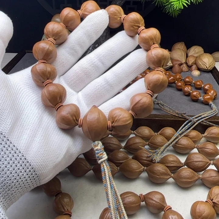 顺***哥手串/手链橄榄核1.8*1.9原皮蒜头铁核