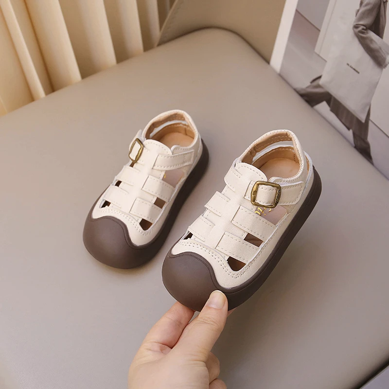 儿童凉鞋2025夏季新款女童运动风罗马软底包头镂空皮鞋男宝沙滩鞋