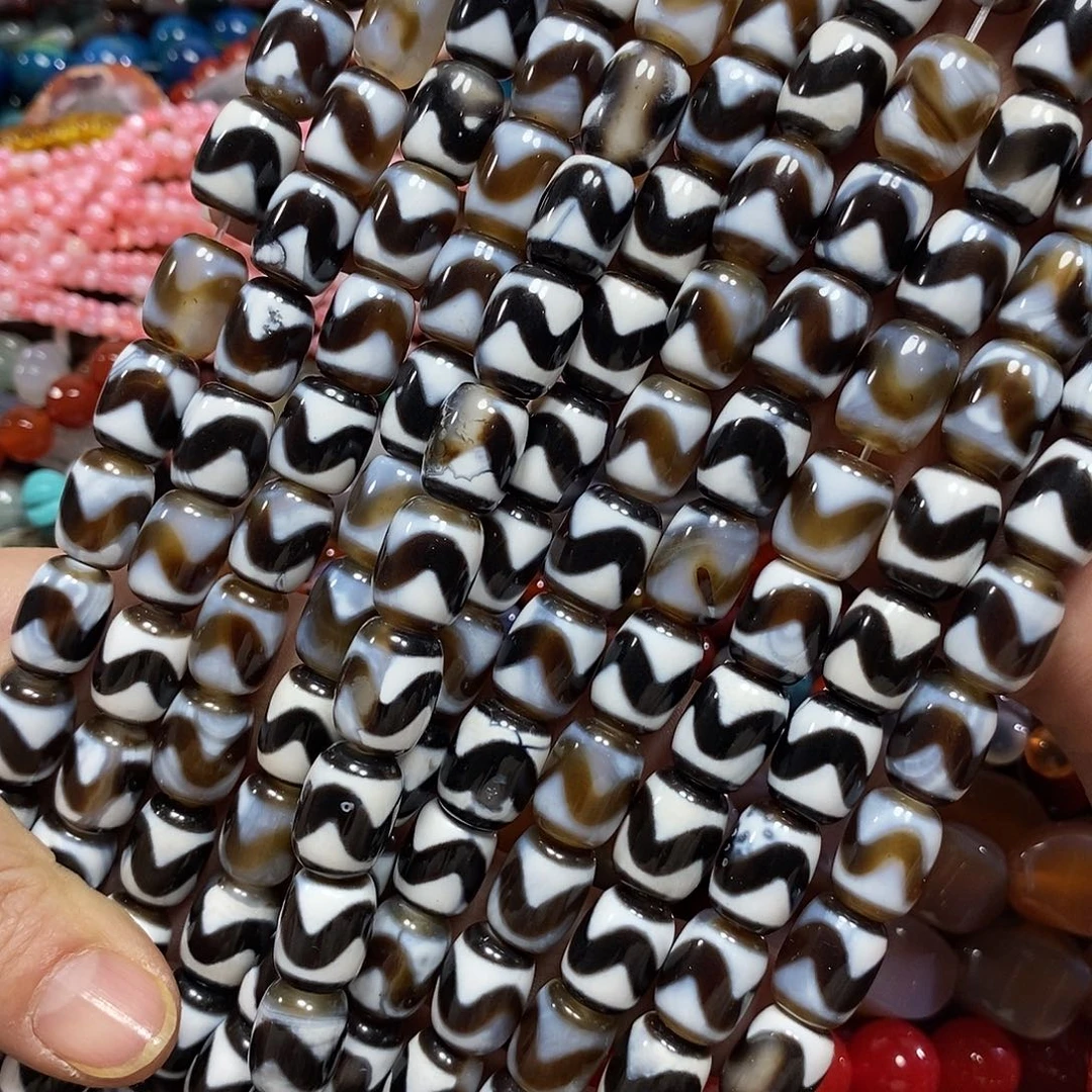 玛瑙/玉髓未镶嵌珠宝半成品虎牙天珠一条卡10*14mm