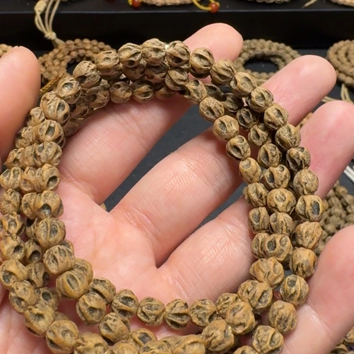 沈***宿吊坠柏香籽/百香籽炮弹坑乱鬼