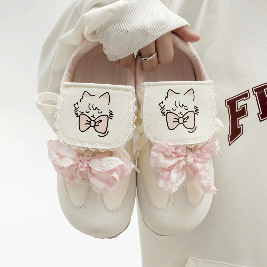 初中生秋季新款平底德训鞋女2025休闲设计翻盖蝴蝶结ins学生板鞋