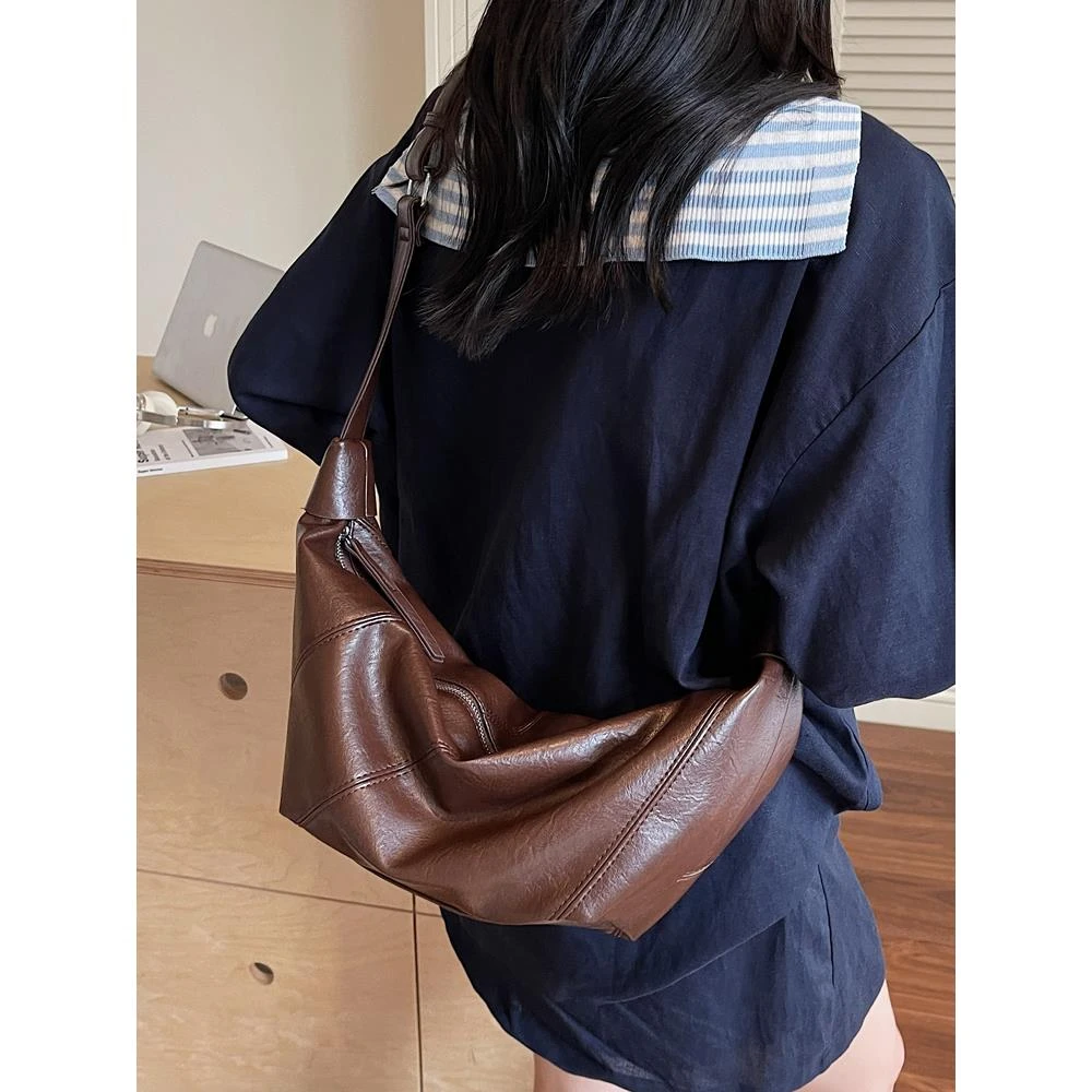 法式复古通勤饺子包包女式2025新款简约休闲单肩包超火小众斜挎包