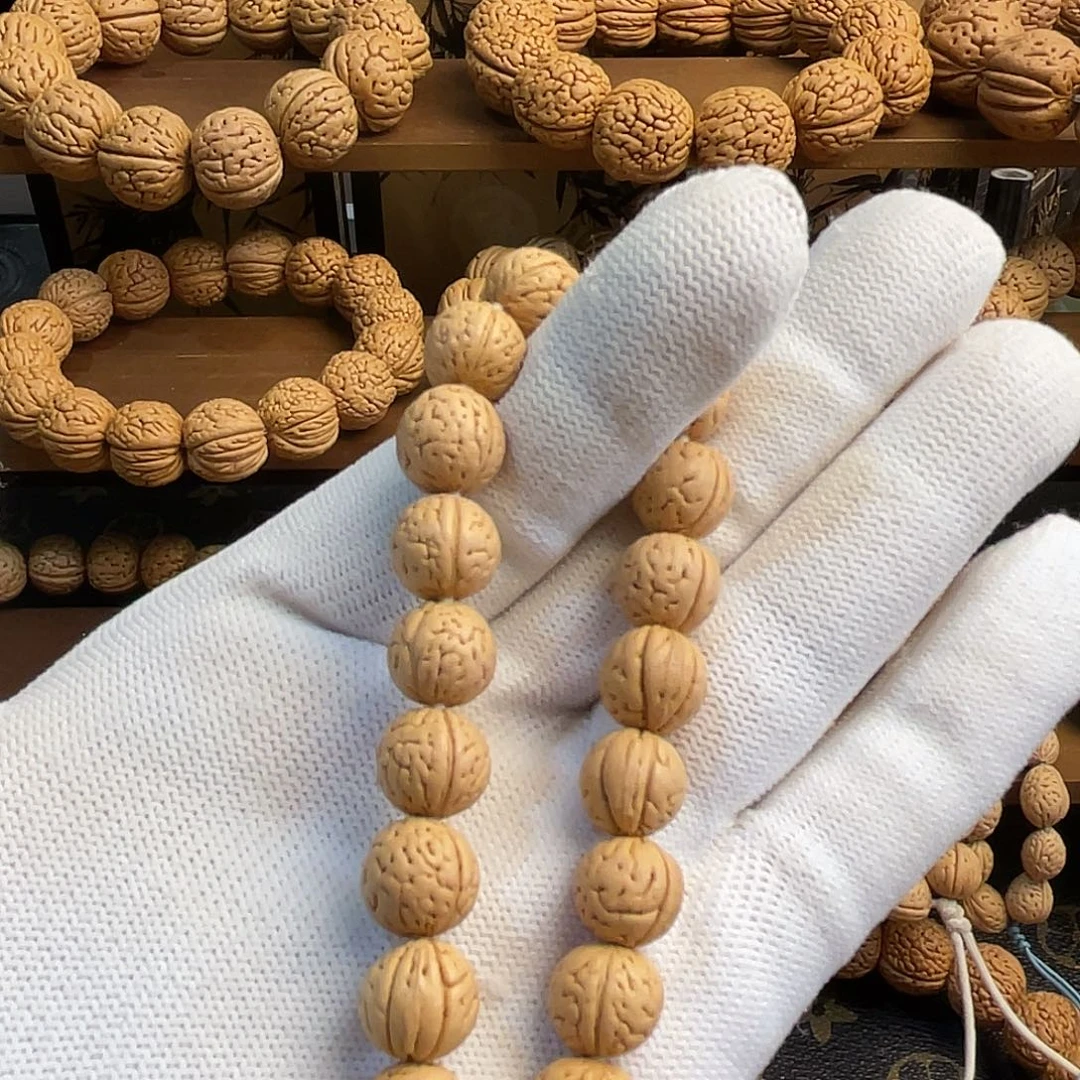 桃核吊坠辣皮小王子手串