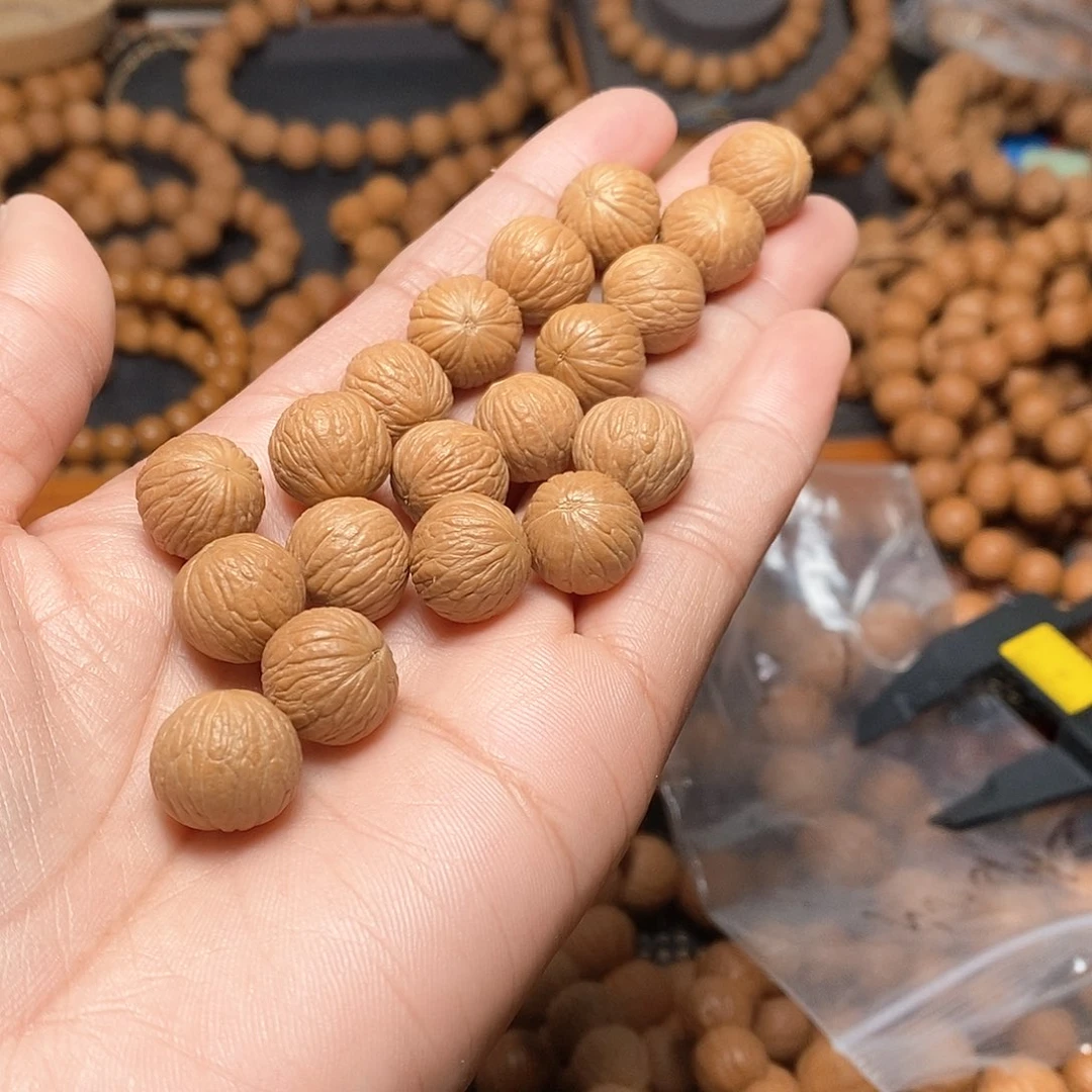 猴头核桃吊坠俗*人凤羽1.40尺寸19颗