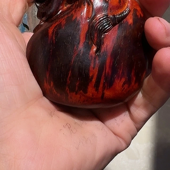 蠻***蠻香榧木檀香紫檀钱袋一个