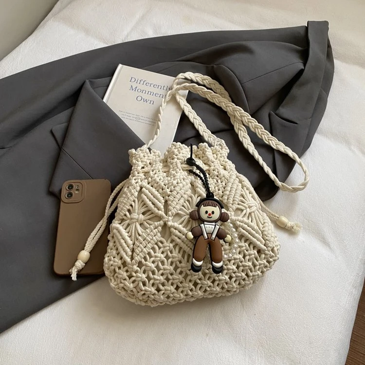 编织草编包包女2025新款潮托特包小众设计水桶包百搭沙滩单肩包