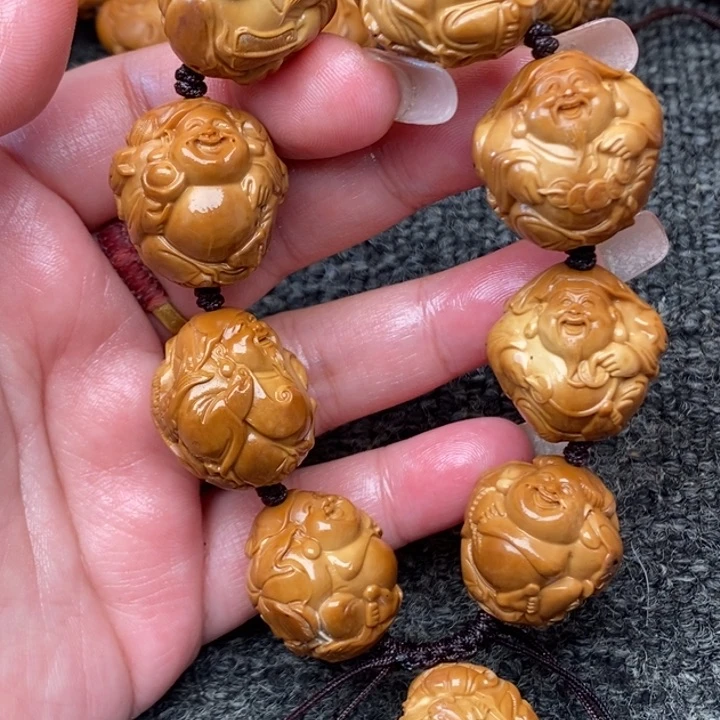 吊坠橄榄核好可怜咯吐了健健康康快快乐乐