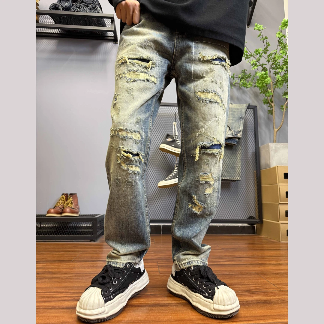秋季破洞补丁设计复古美式休闲水洗做旧牛仔裤男高街锥形美式5501