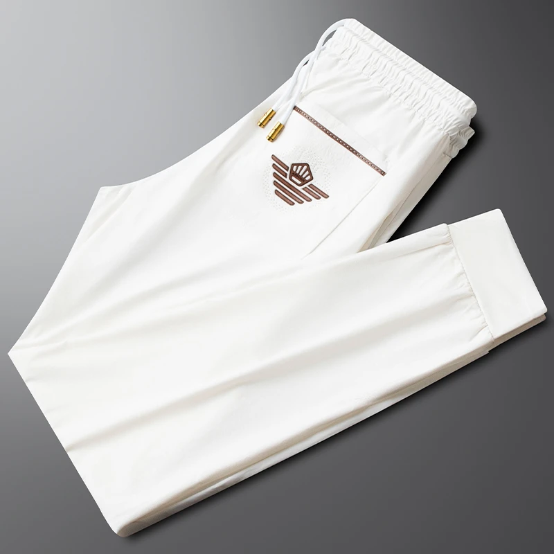 施摩瓦戈轻奢夏季薄款白色冰丝裤男修身束脚速干运动裤小脚休闲裤