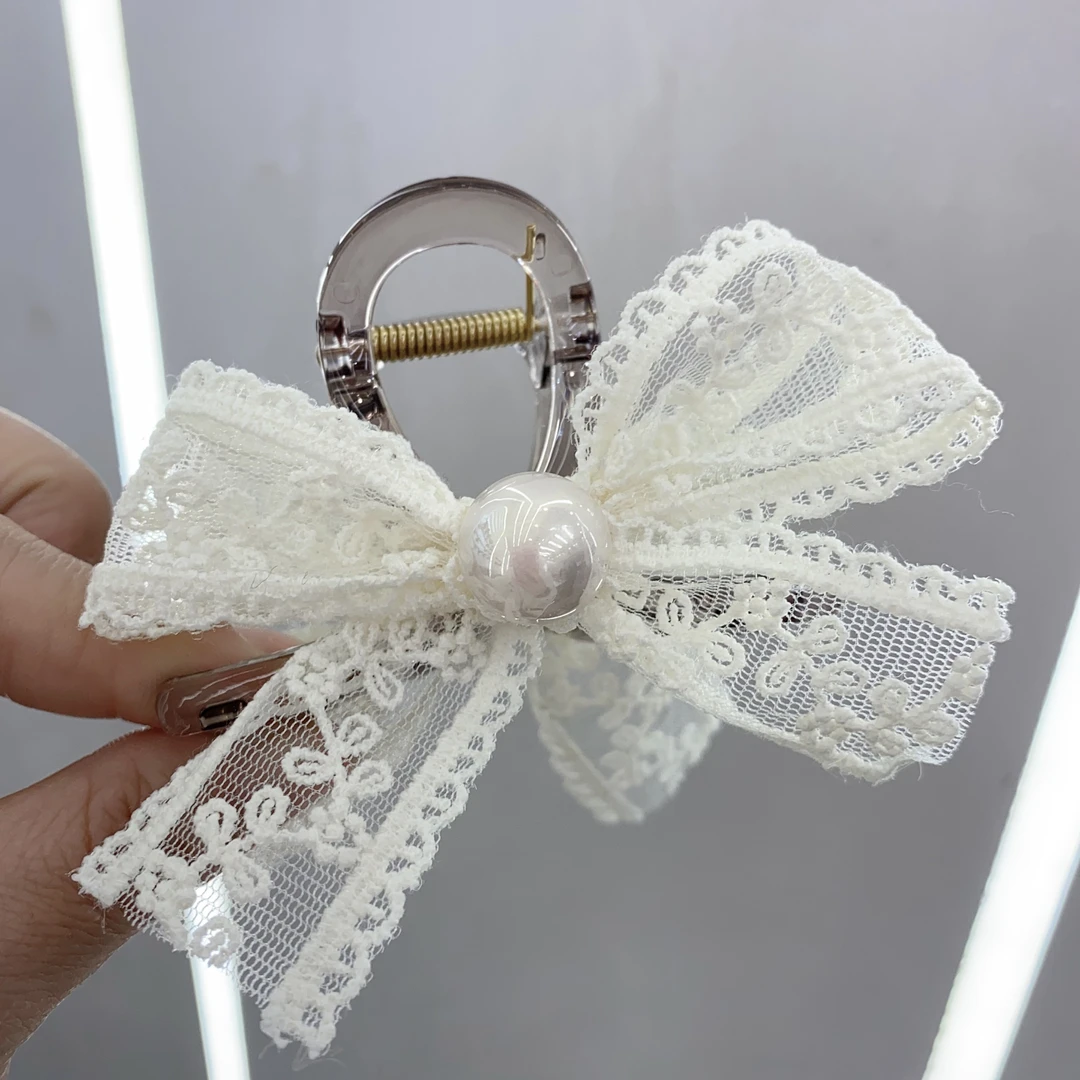 A61杏色蕾丝蝴蝶结长不大抓夹