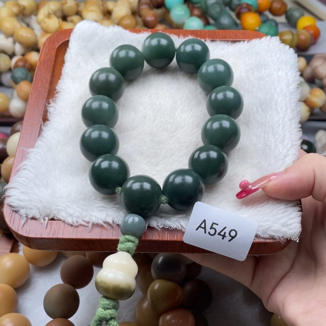 罗***夜菩提根/象牙果吊坠瑕A549圆珠手持17mm一串