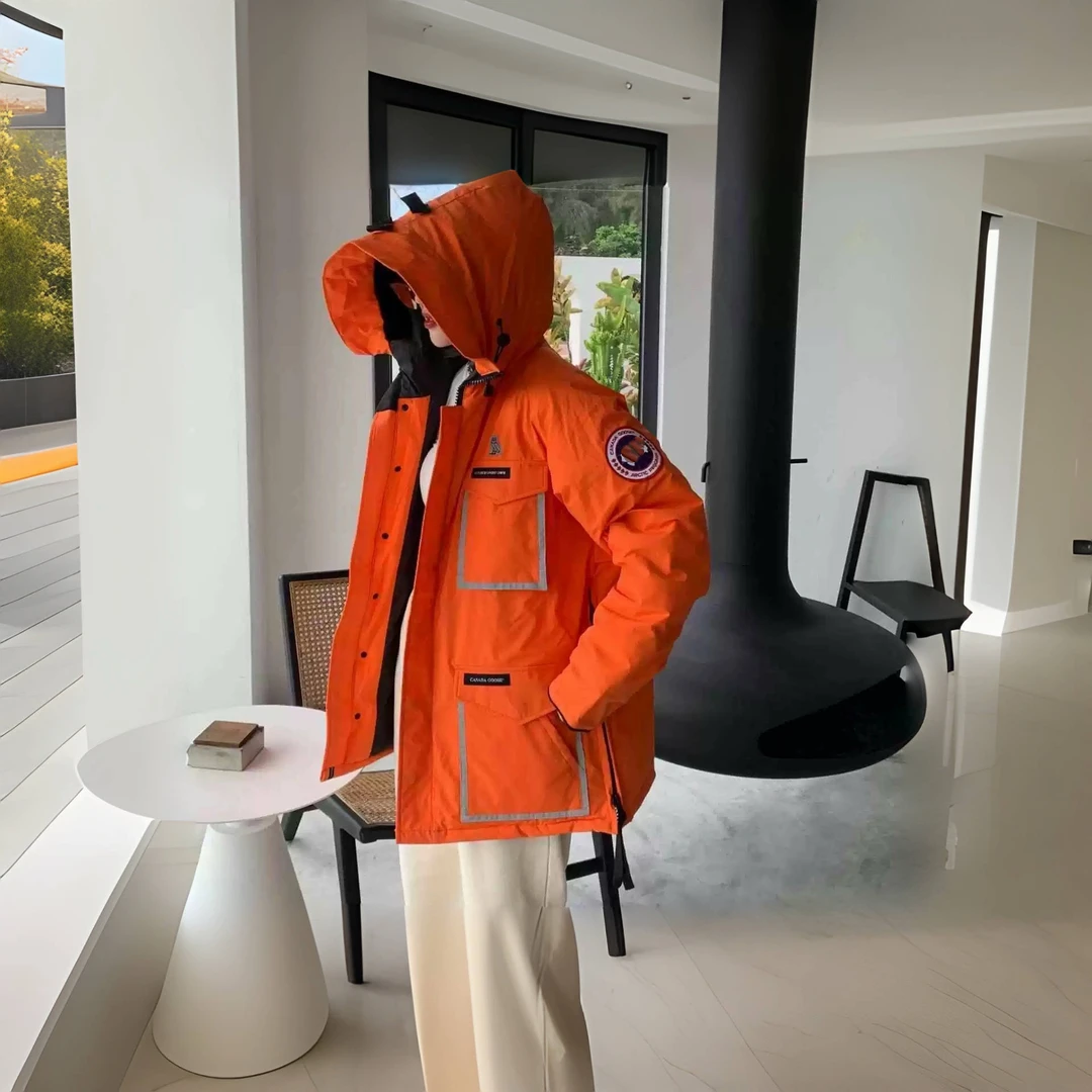 1209高奢女装精选时尚随意绽放 加厚爱麻橙连帽鹅绒服