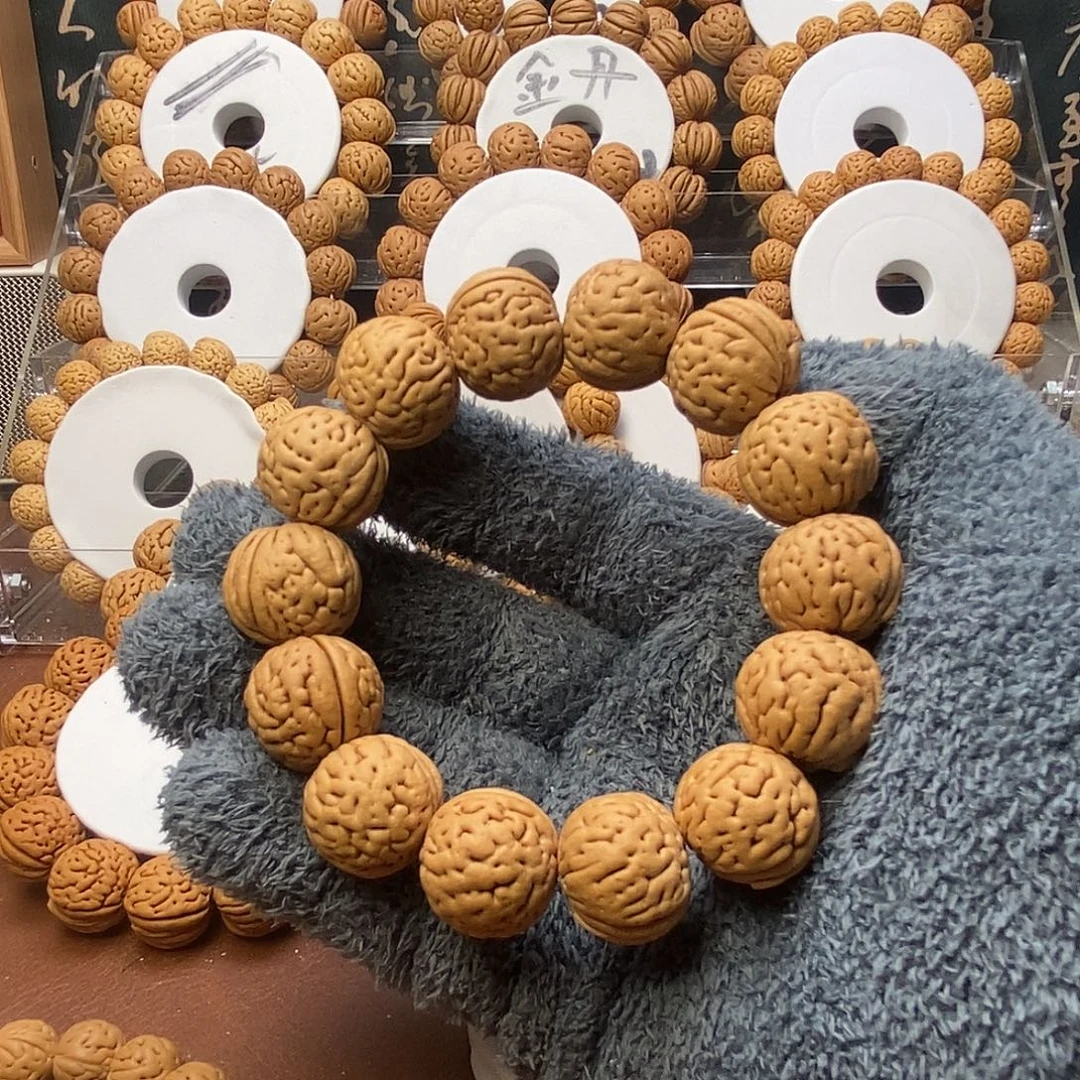 天***、吊坠桃核盘锦野生肌肉19..