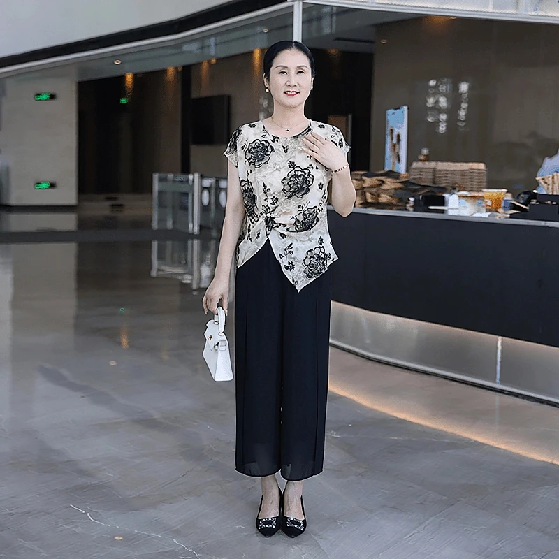 小衫蕾丝显瘦气质洋气时尚夏季法式拼接休闲减龄收腰修身印花名媛