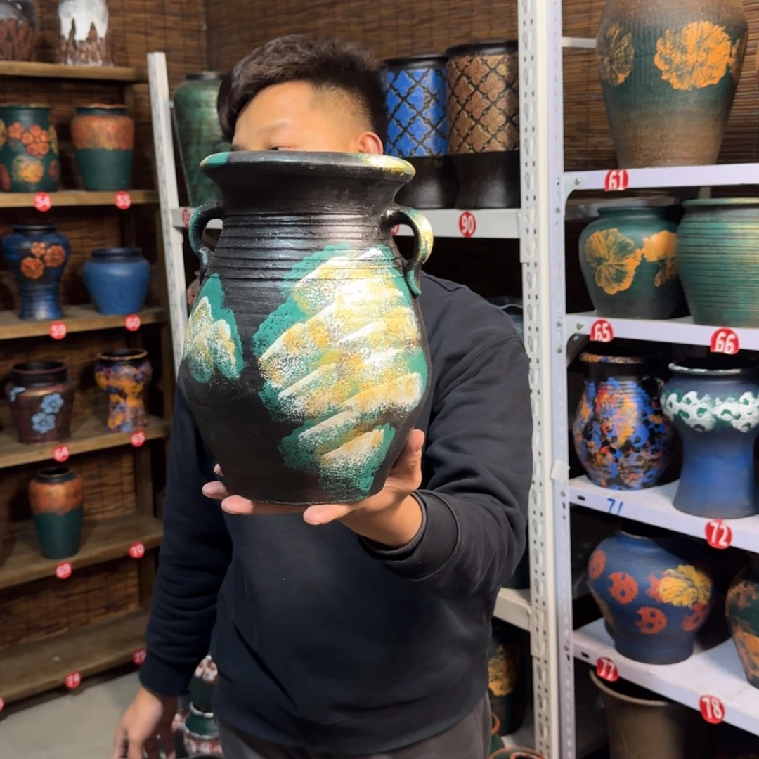 有孔红陶浮雕花盆炸炸炸