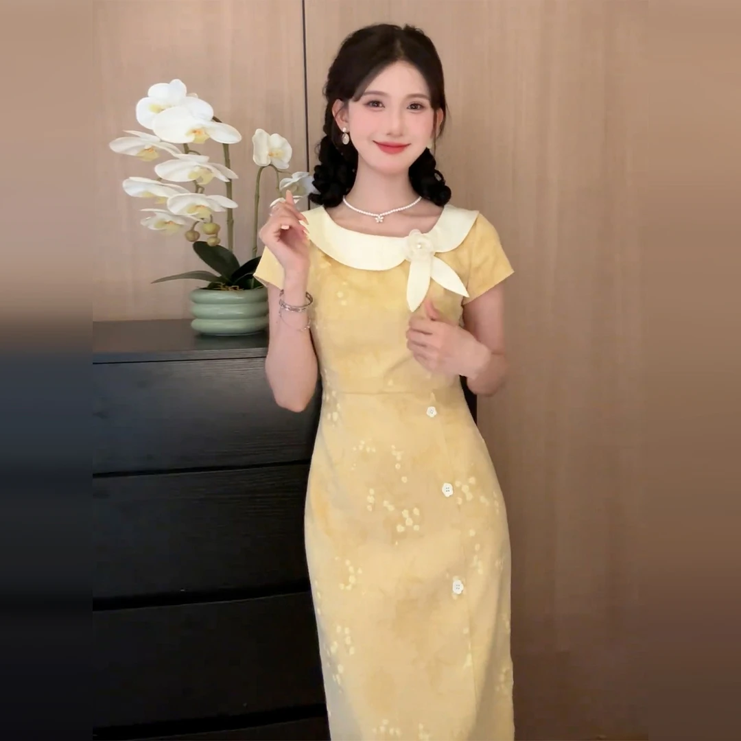 黄色巨好看的掐腰连衣裙子2025夏季新款今年流行爆款新中式长裙女