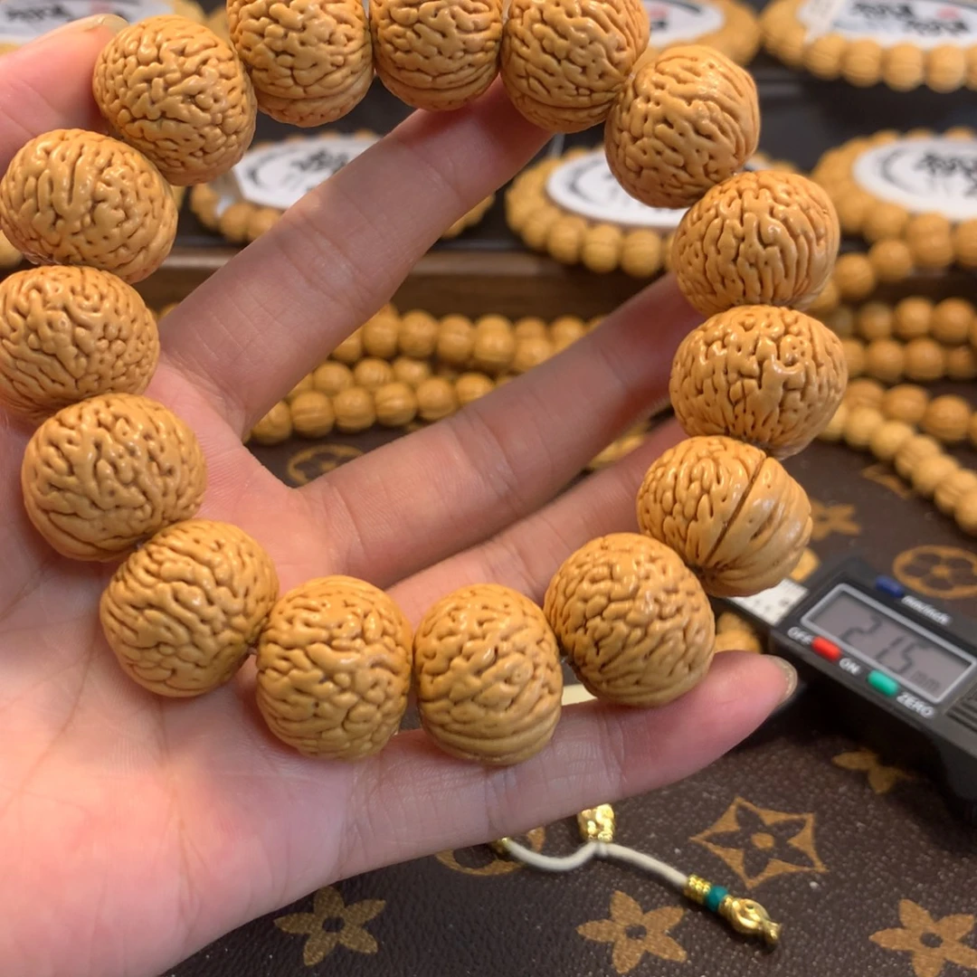 琦***玉精品桃核白月光手串