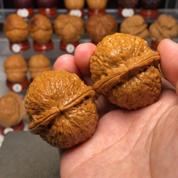 荷***弹把件文玩核桃777麒麟铁狮子