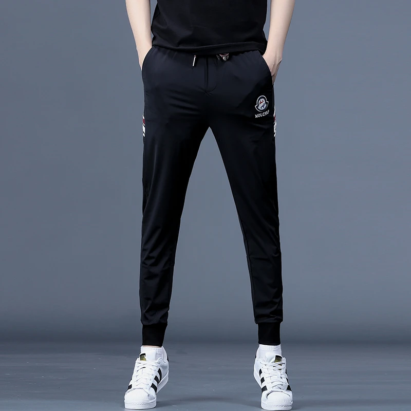 秋季新款潮流刺绣休闲裤男士冰丝裤子时尚小脚裤修身弹力运动男裤