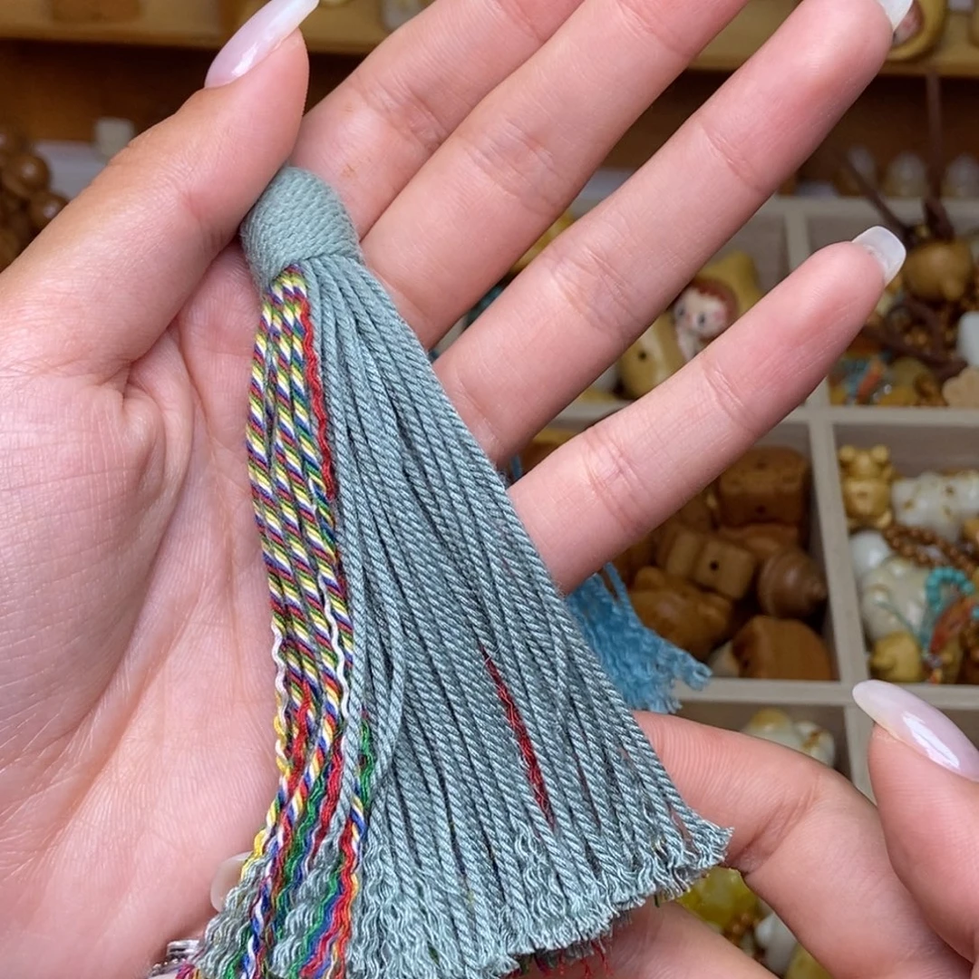 霏***.吊坠猴头核桃雾霾蓝流苏