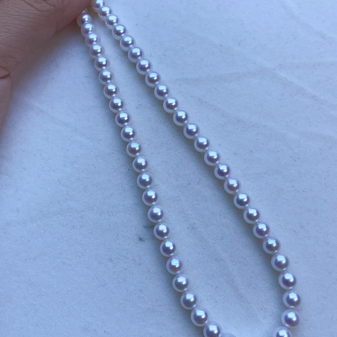 宁****淡水珍珠18K金镶嵌颈饰
