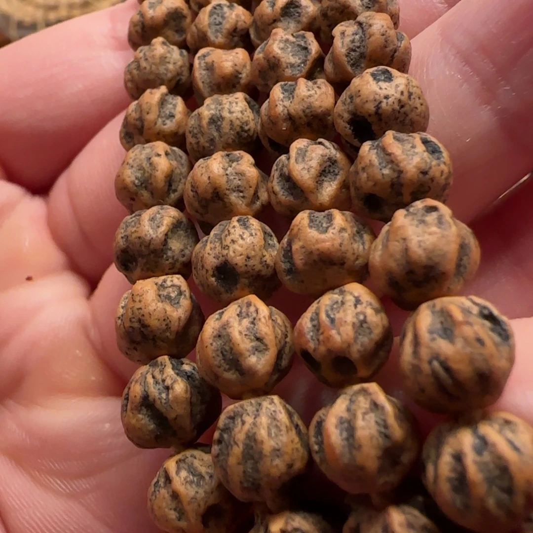 伊***金柏香籽/百香籽吊坠