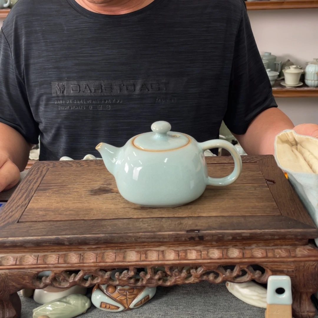 瓷片天青釉支烧柿圆壶