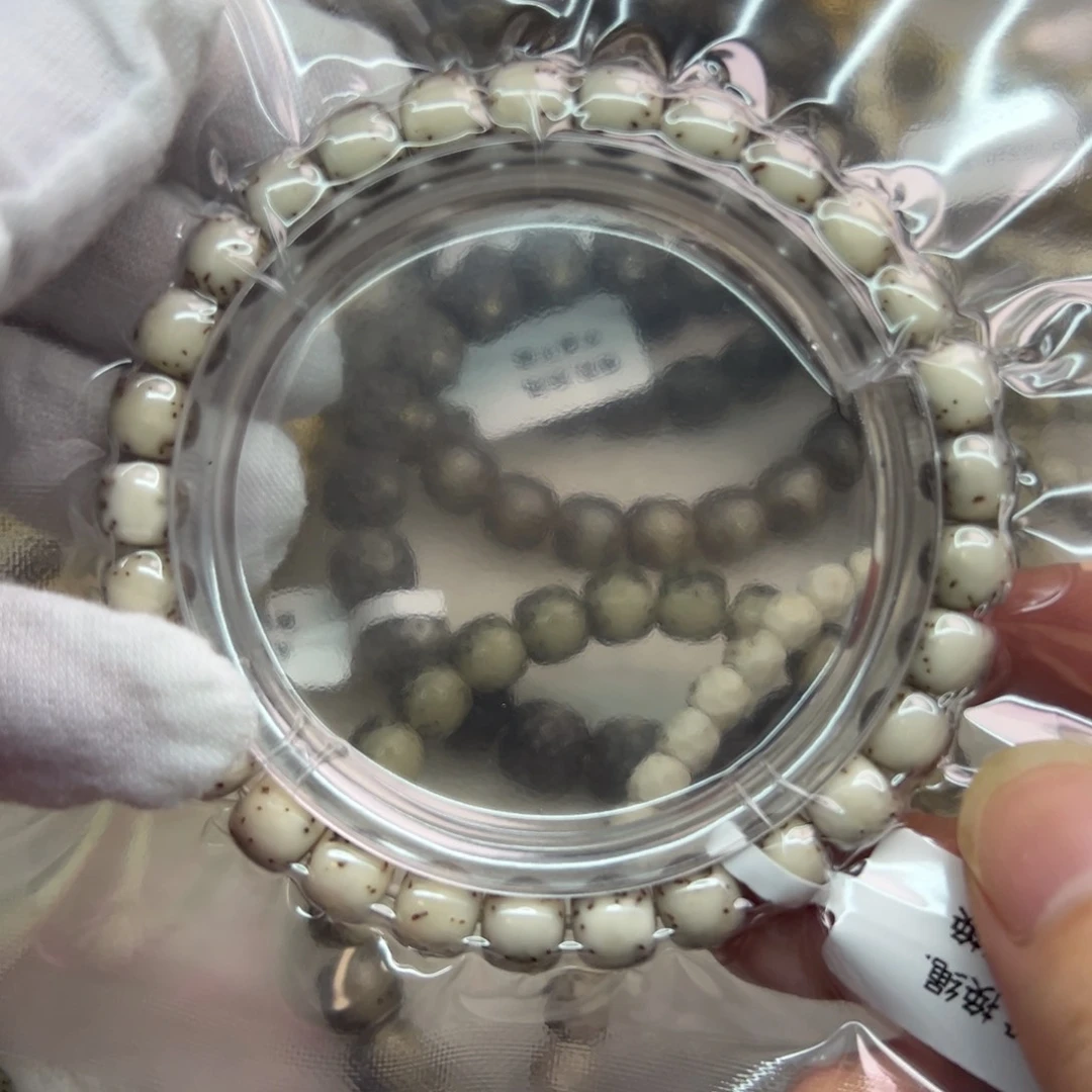 星月菩提手串流***粉星月糯冰河豚