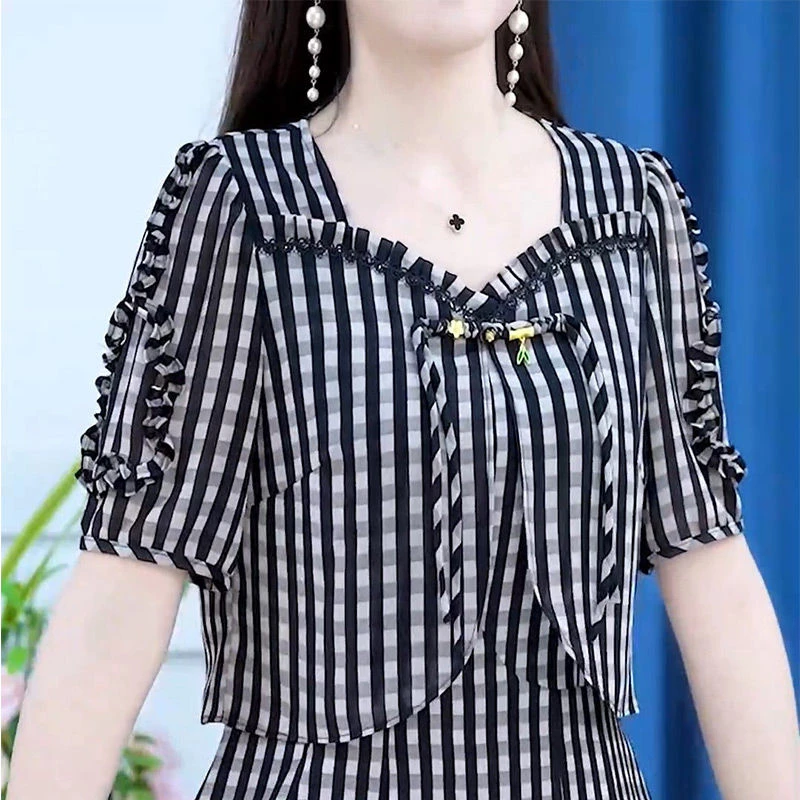 2025年夏季新款气质收腰显瘦短袖连衣裙女时尚印花条纹木耳边裙子