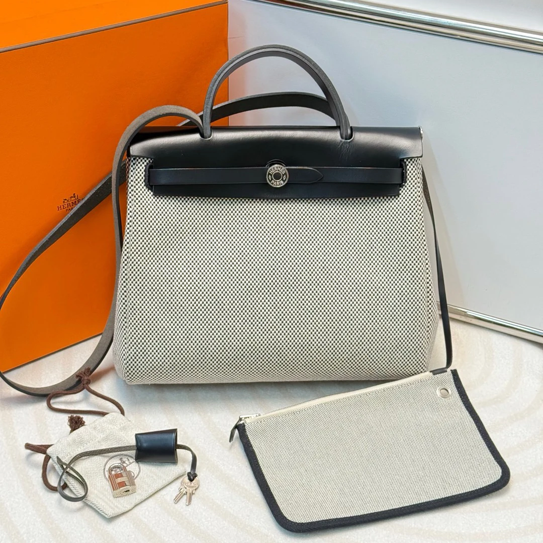 95新 Hermes/爱马仕 黑白帆布拼皮华夫格herbag31单肩包677350297